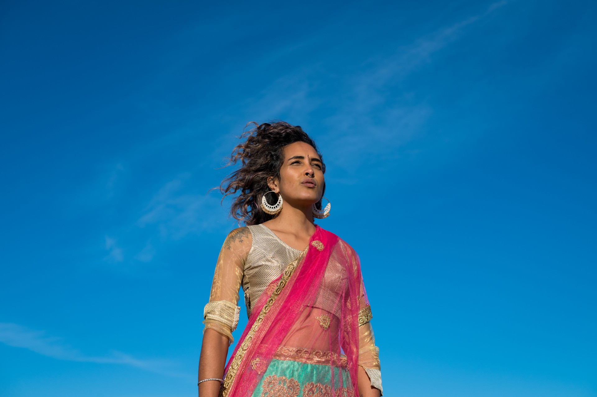 Low angle view of beautiful woman in traditional attire