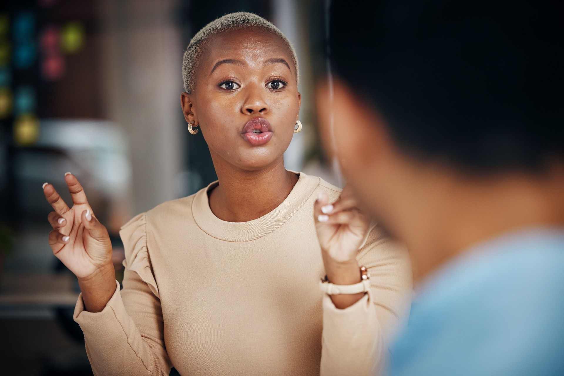 Black woman, communication and talking business people, office friends or partnership team consulting on project. Conversation, collaboration and employees speaking, chat and discussion on strategy
